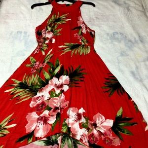 Red floral halter high/low dress with double button detail behind neck.